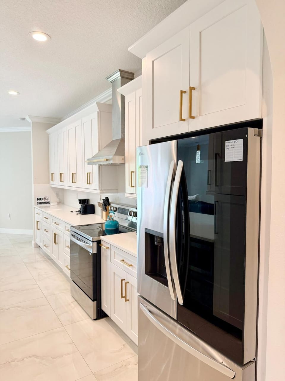 Kitchen or kitchenette, oven, stove, toaster