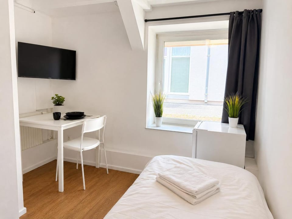 Moderne Einzelzimmer mit eigenem Bad & Gemeinschaftsküche Apartment hotel in Frankfurt