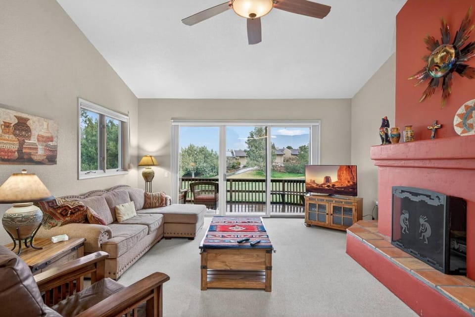 View (from property/room), Balcony/Terrace, Living room, Garden view, fireplace