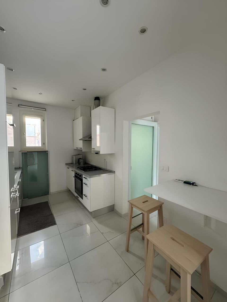 Kitchen or kitchenette, oven, stove