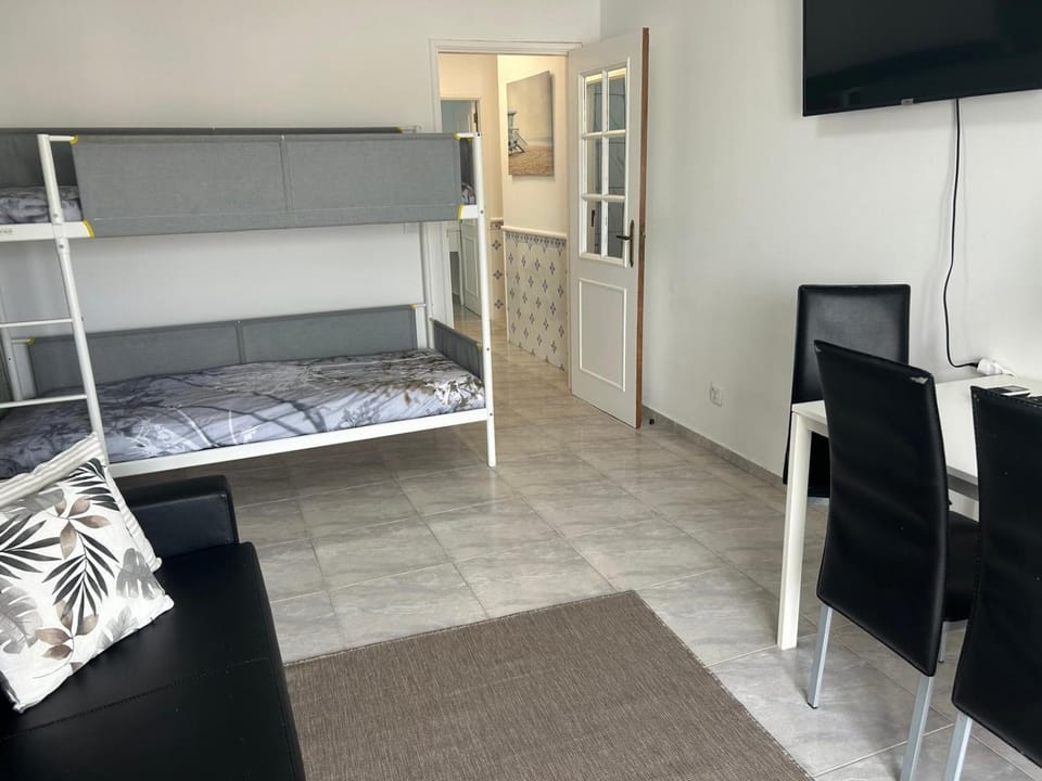 TV and multimedia, Living room, Seating area, bunk bed