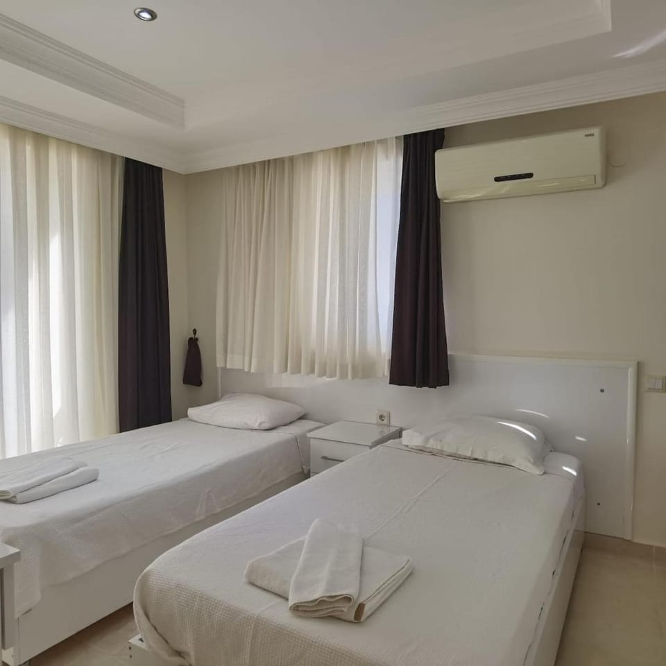 BİTUR PARK VİLLA E5 3-Bedroom with Shared Pool & Apartment in Ölüdeniz