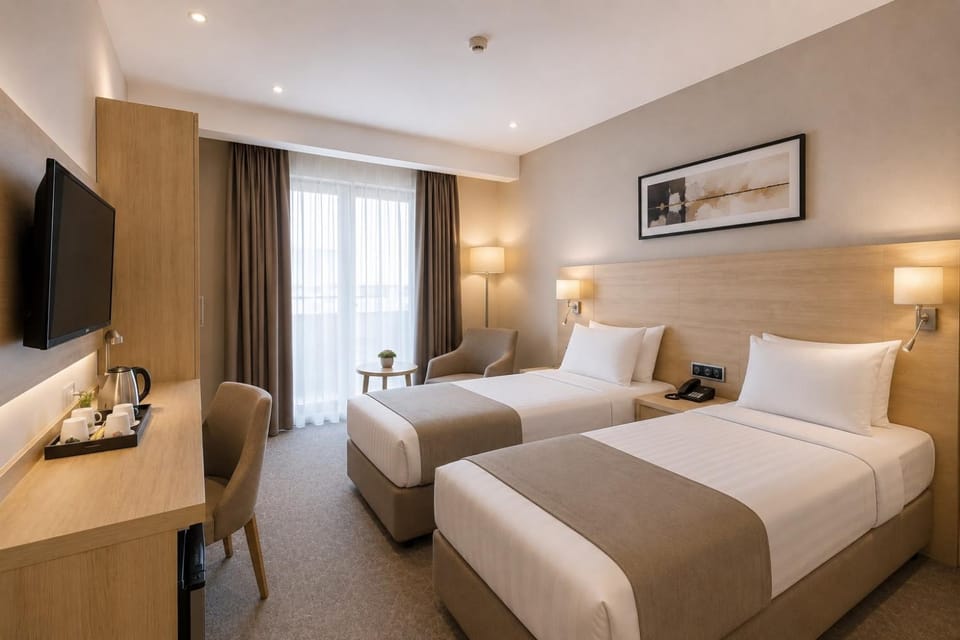 Bed, TV and multimedia, Coffee/tea facilities, Photo of the whole room, Bedroom, hair dresser, minibar, safe, wardrobe, air conditioner