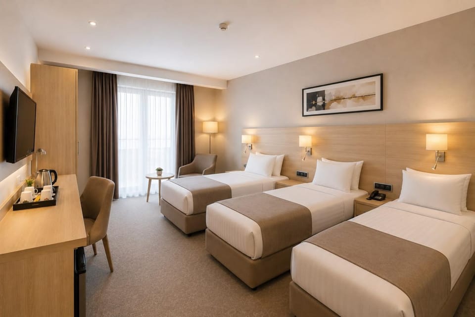 Bed, TV and multimedia, Coffee/tea facilities, Photo of the whole room, Bedroom, minibar, safe, wardrobe, air conditioner