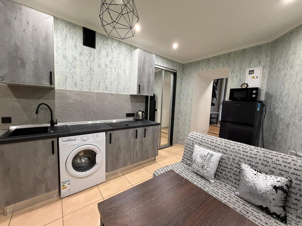 Kitchen or kitchenette, Living room, Seating area, stove