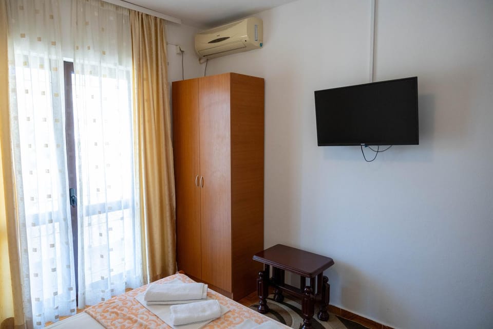 Bed, TV and multimedia, Bedroom, towels, wardrobe, air conditioner