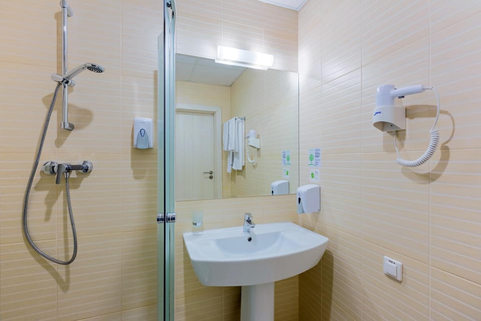 Shower, Toilet, hair dryier, towels