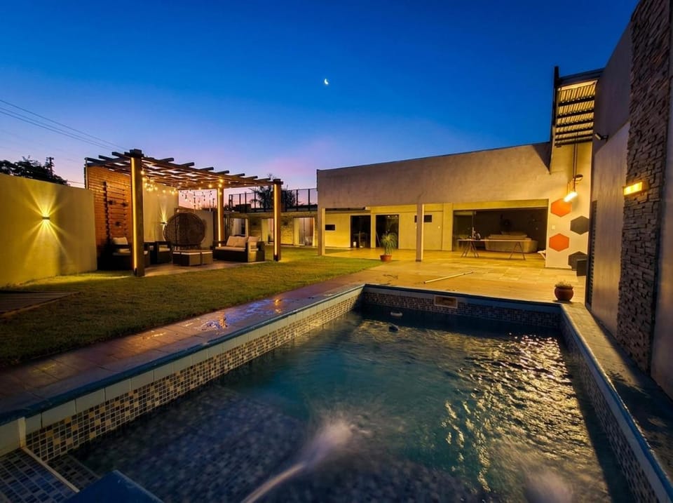 Property building, Night, Pool view, Swimming pool