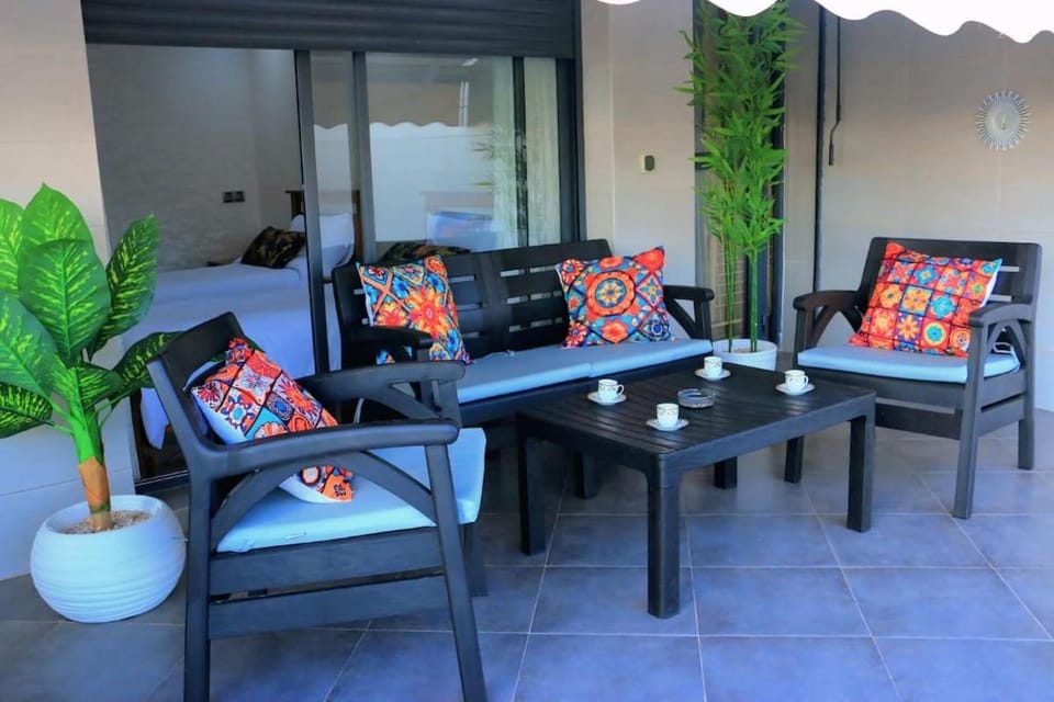 Patio, Day, View (from property/room), Balcony/Terrace, Living room, Seating area, Sunset