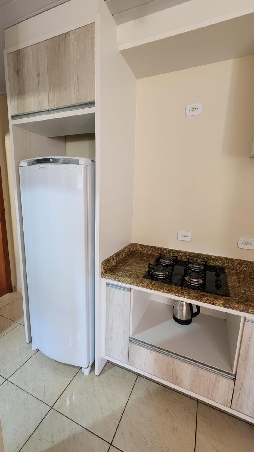 Kitchen or kitchenette, stove