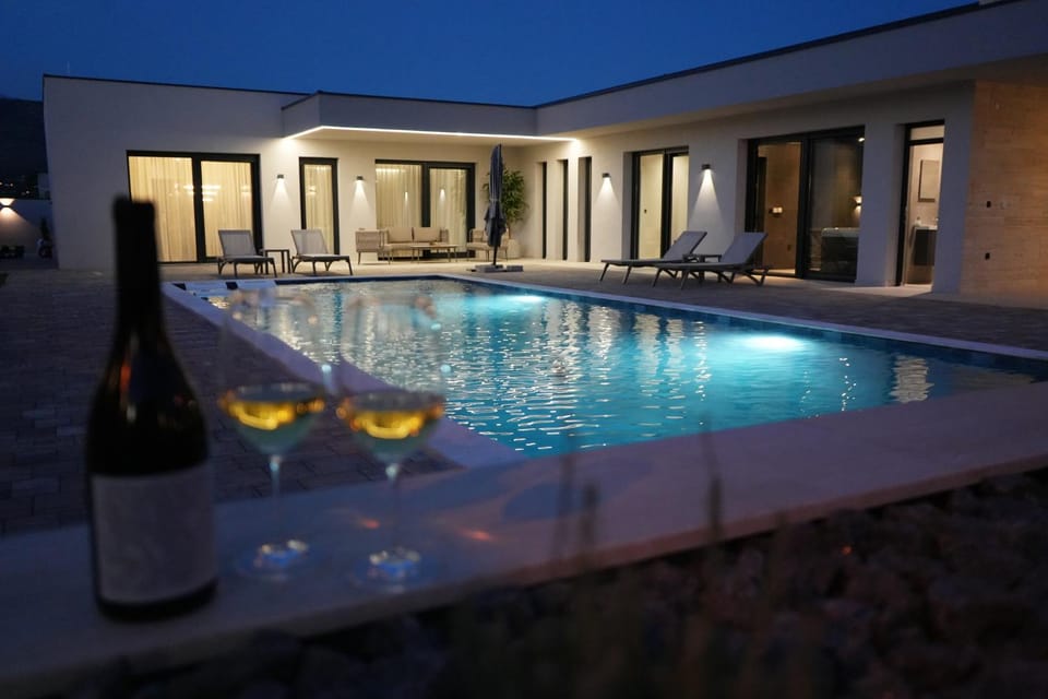 Patio, Night, Pool view, Swimming pool, sunbed