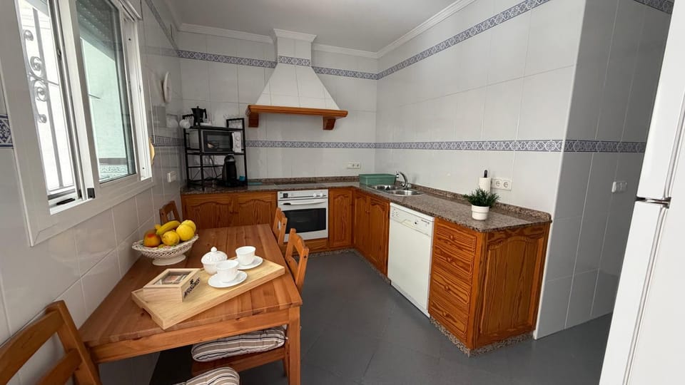 Kitchen or kitchenette, oven, stove