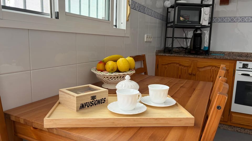 Kitchen or kitchenette, dishwasher, stove, toaster