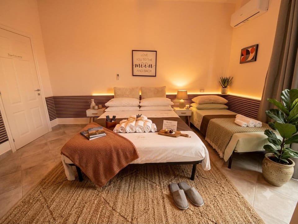 Bed, Photo of the whole room, Bedroom, towels, air conditioner