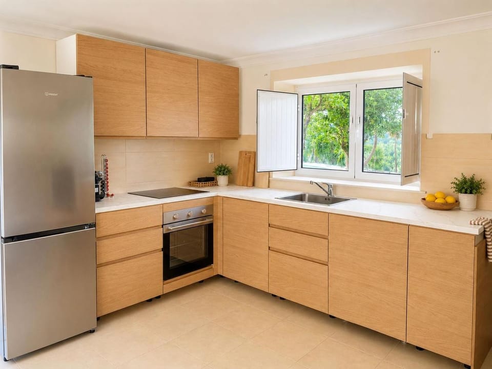 Kitchen or kitchenette, dishwasher, oven, stove