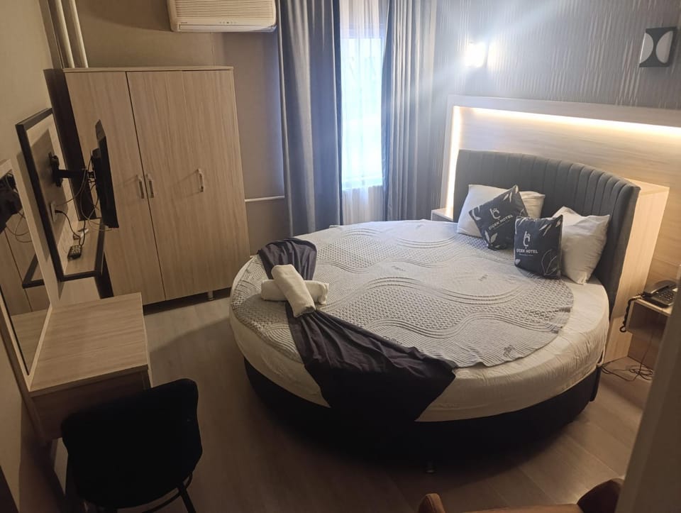 Bed, Bedroom, Breakfast, towels, wardrobe, air conditioner