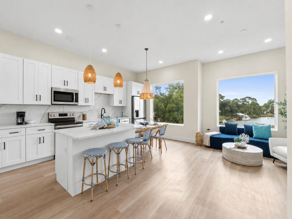 Kitchen or kitchenette, Living room, Seating area, Sea view, furniture, microwave, stove