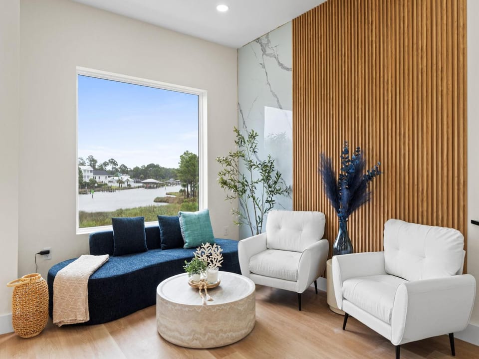 View (from property/room), Living room, Seating area, Lake view, Sea view, furniture