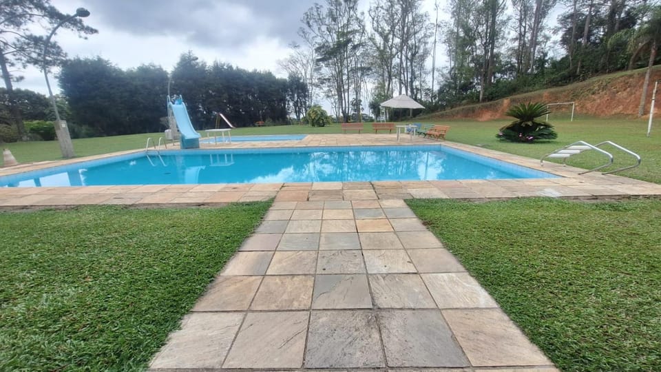Sitio Los Pimentas House in Cotia