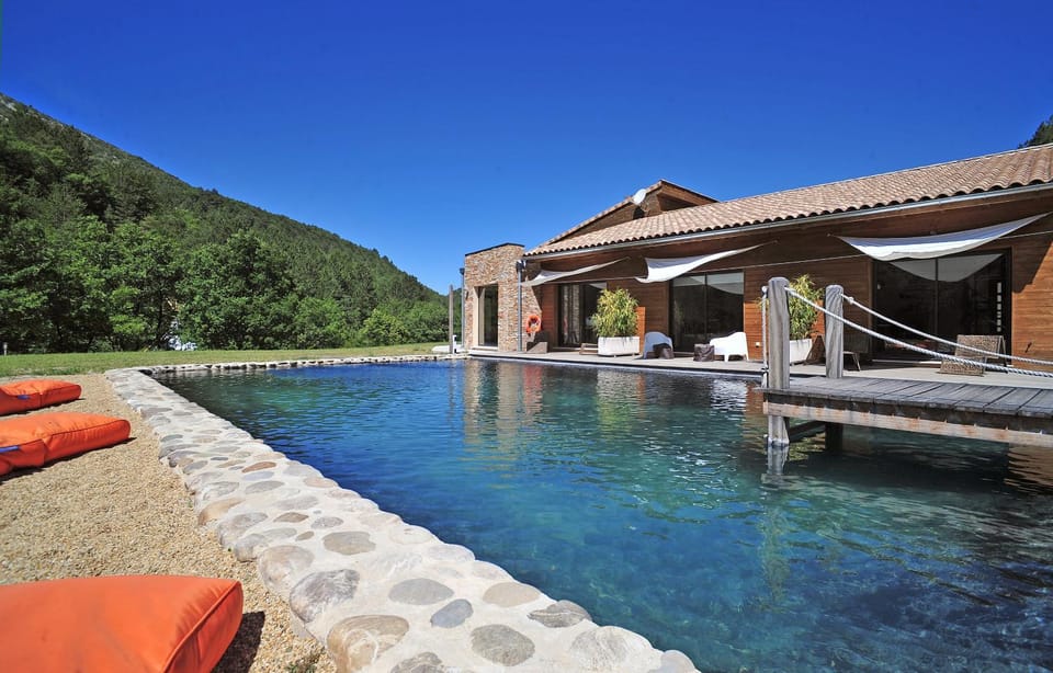Property building, Nearby landmark, Day, Natural landscape, Mountain view, Pool view, Swimming pool, sunbed