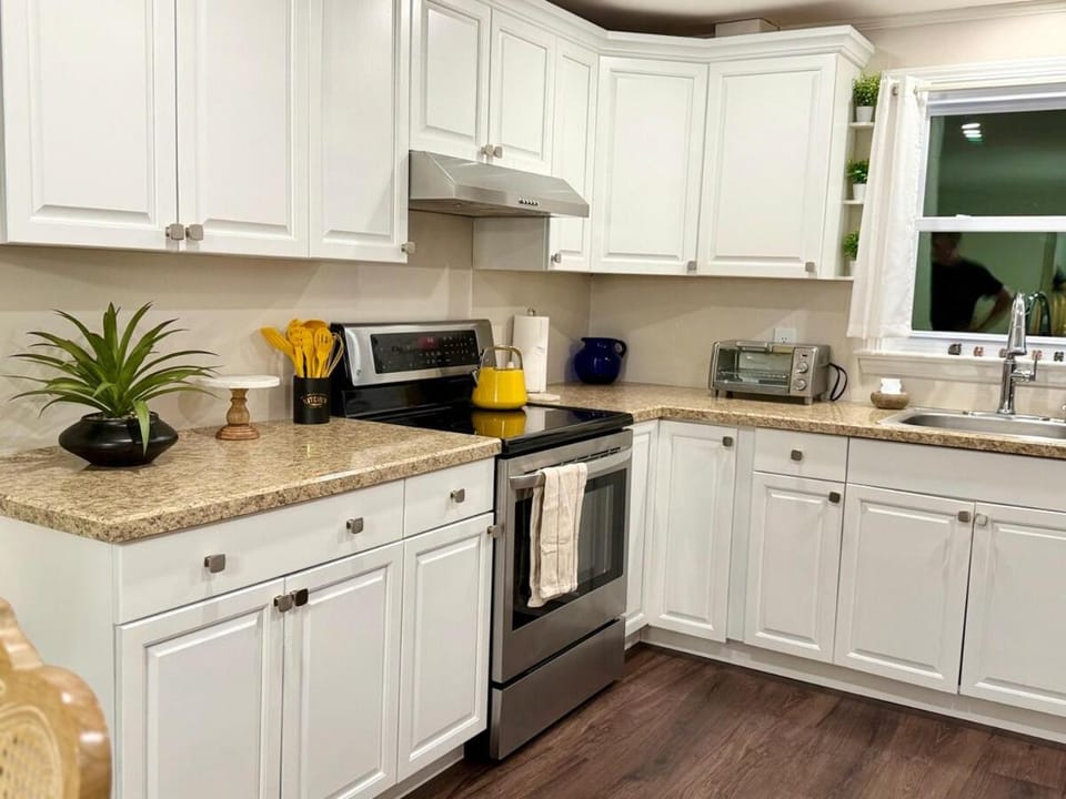 Kitchen or kitchenette, oven, stove, toaster