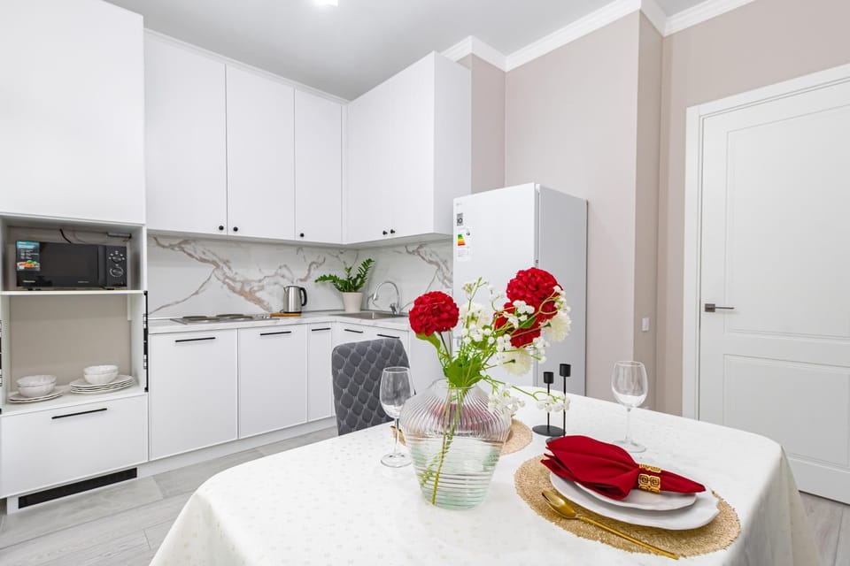 Kitchen or kitchenette, Dining area, dishwasher, stove, washing machine, dryer