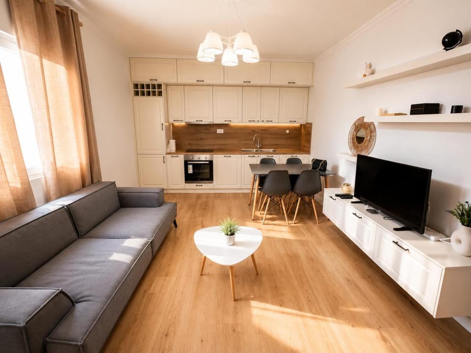 TV and multimedia, Kitchen or kitchenette, Living room, Seating area, Dining area, oven, stove, air conditioner