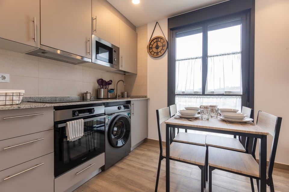 Dining area, dishwasher, oven, stove, toaster