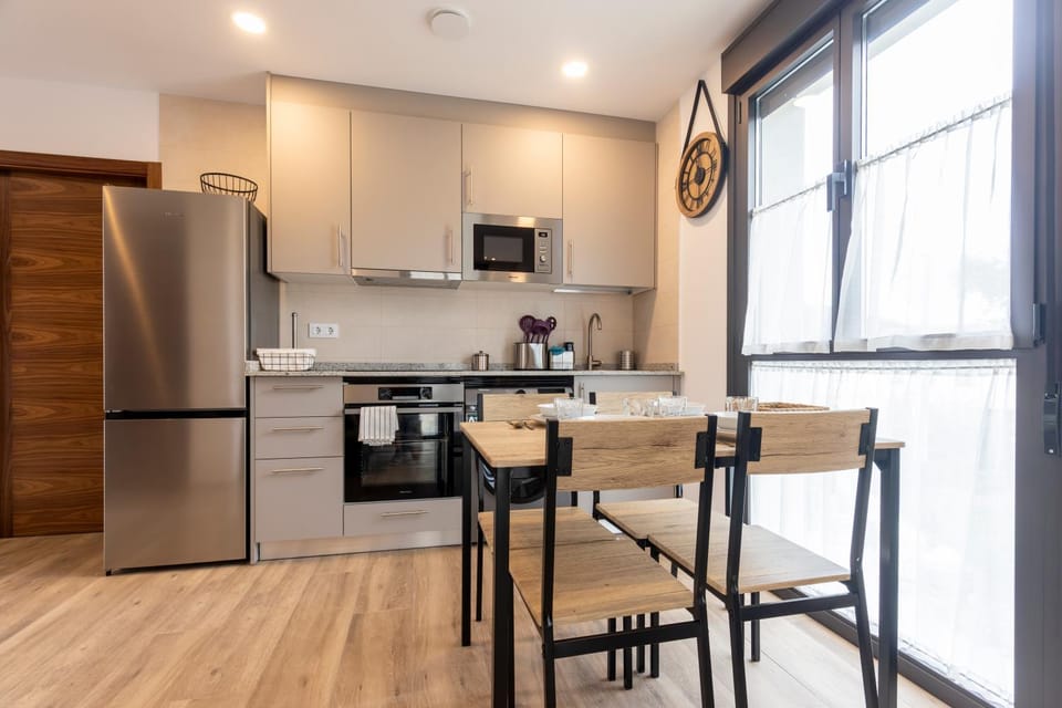 Kitchen or kitchenette, Dining area, dishwasher, oven, stove, toaster
