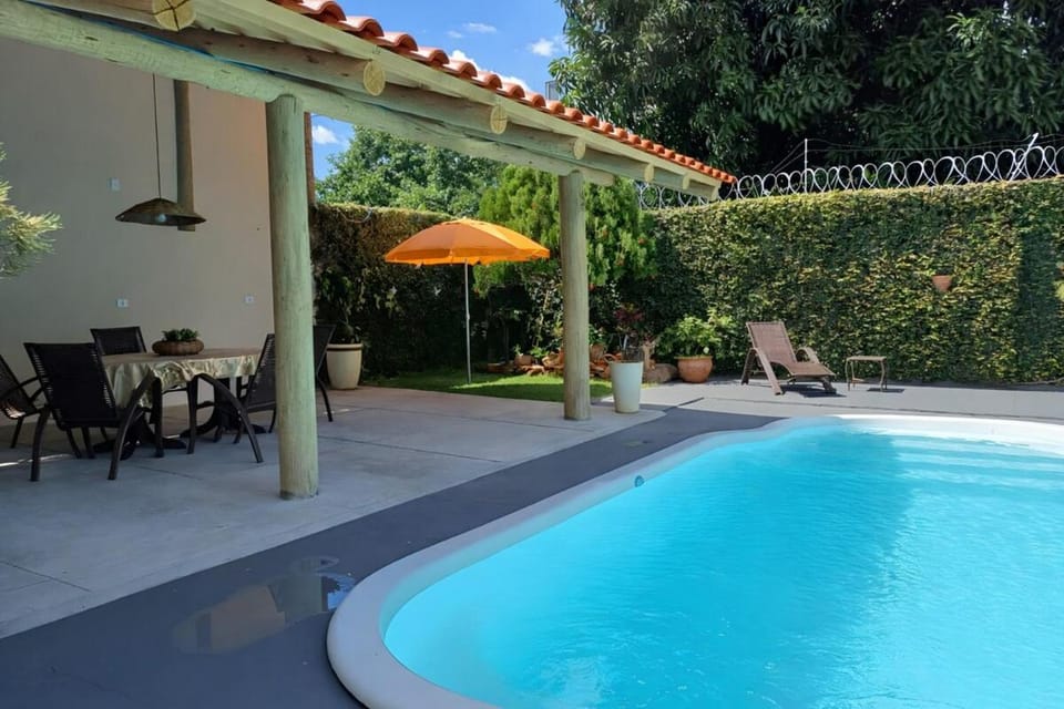 Property building, Patio, Day, Garden, Dining area, Garden view, Pool view, Swimming pool, sunbed