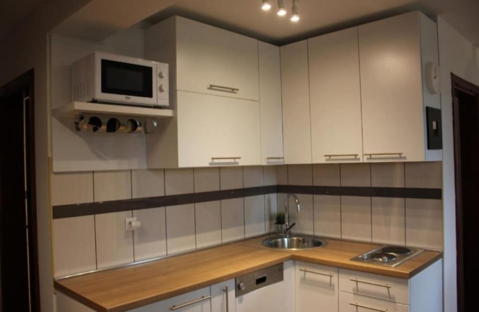 Kitchen or kitchenette, stove