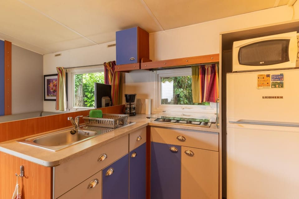 Kitchen or kitchenette, stove, toaster