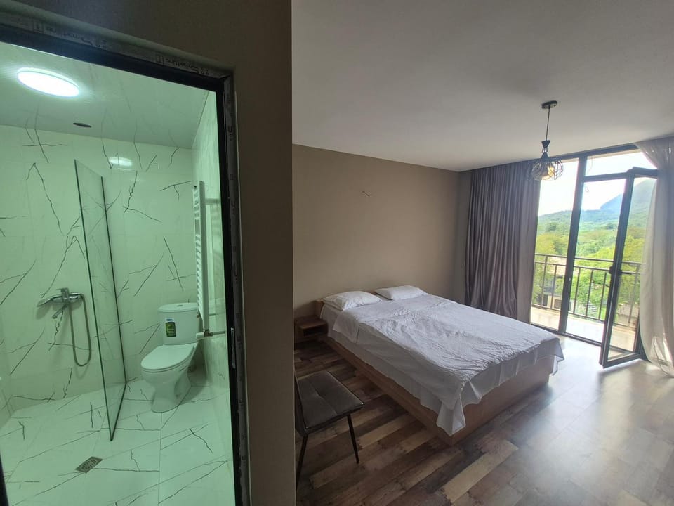 Shower, Toilet, Bed, Bathroom, Photo of the whole room, Bedroom