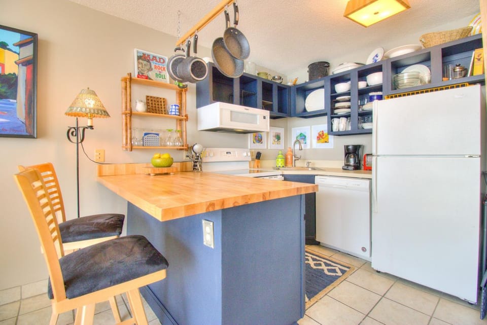 Kitchen or kitchenette, dishwasher, oven, stove, toaster
