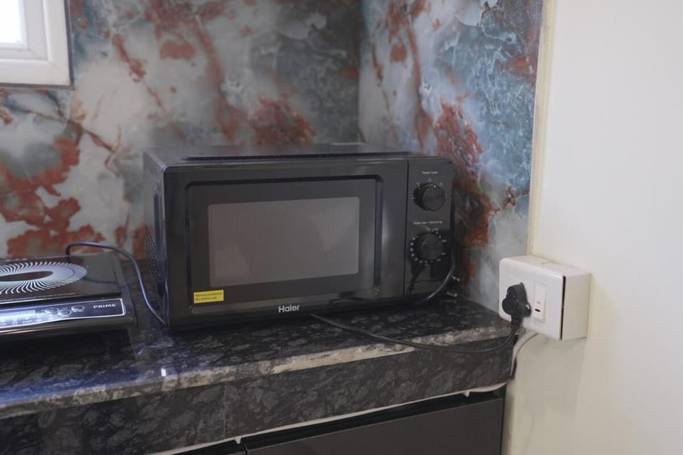 R&D Haven-Newly built Cozy 1BHK Nr Airport AC KIT PRKG No Smoking Apartment in Punjab, India