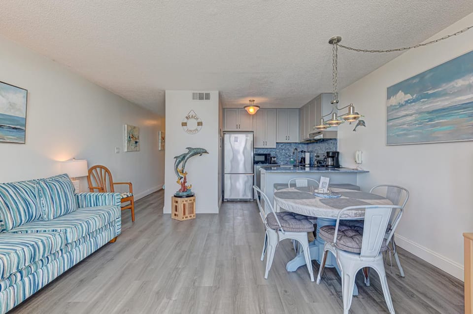 Living room, Seating area, Dining area, oven, stove, kitchen