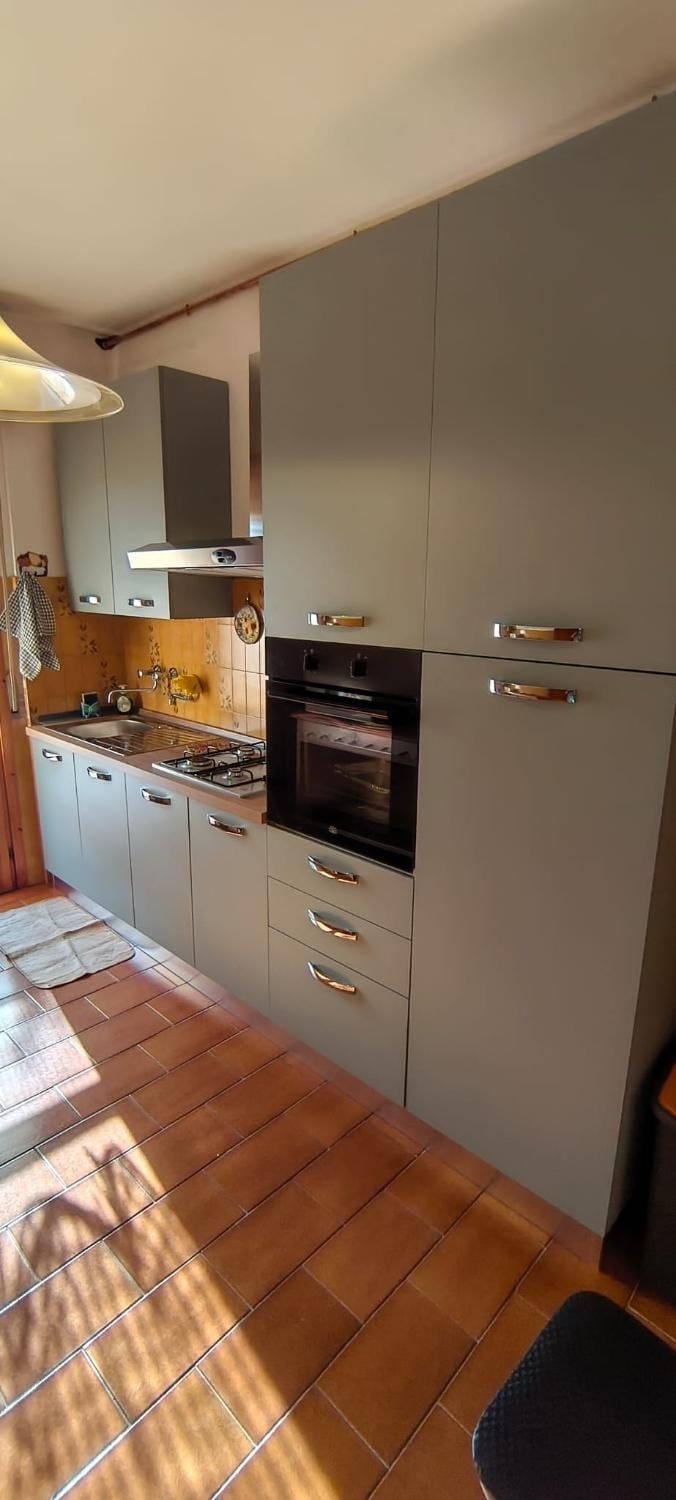 Kitchen or kitchenette, oven, stove