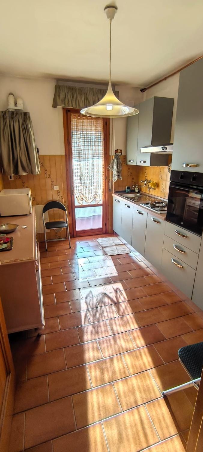 Kitchen or kitchenette, oven, stove