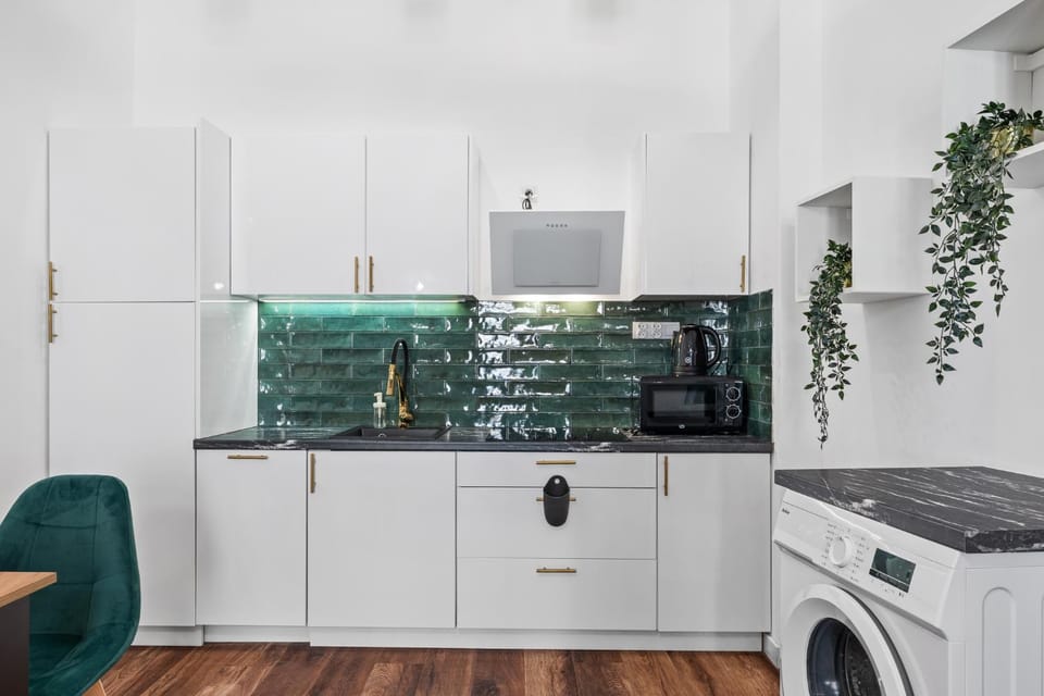 Kitchen or kitchenette, dishwasher, stove, washing machine