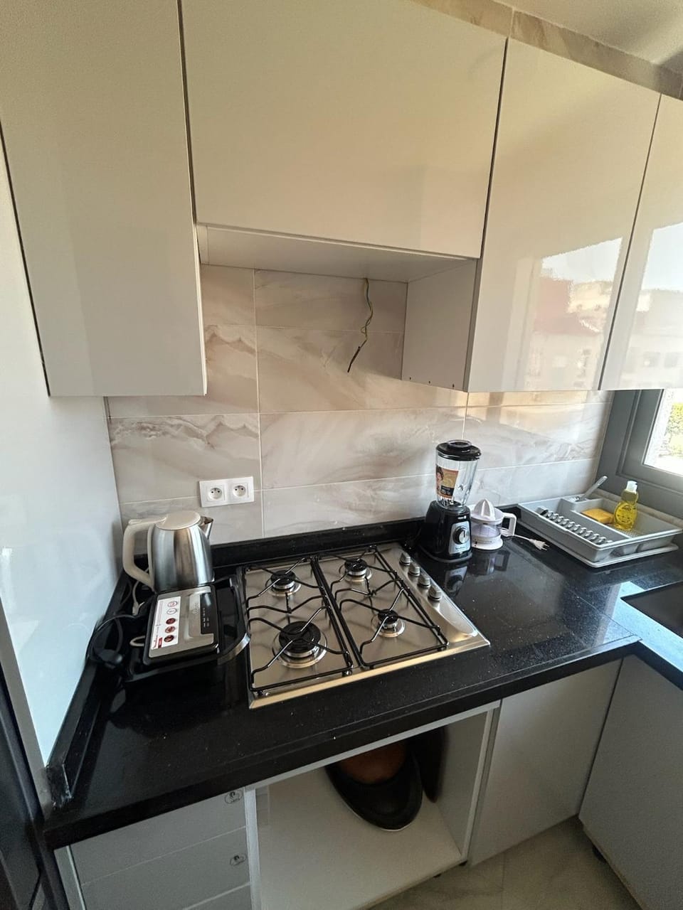 Kitchen or kitchenette, stove, toaster