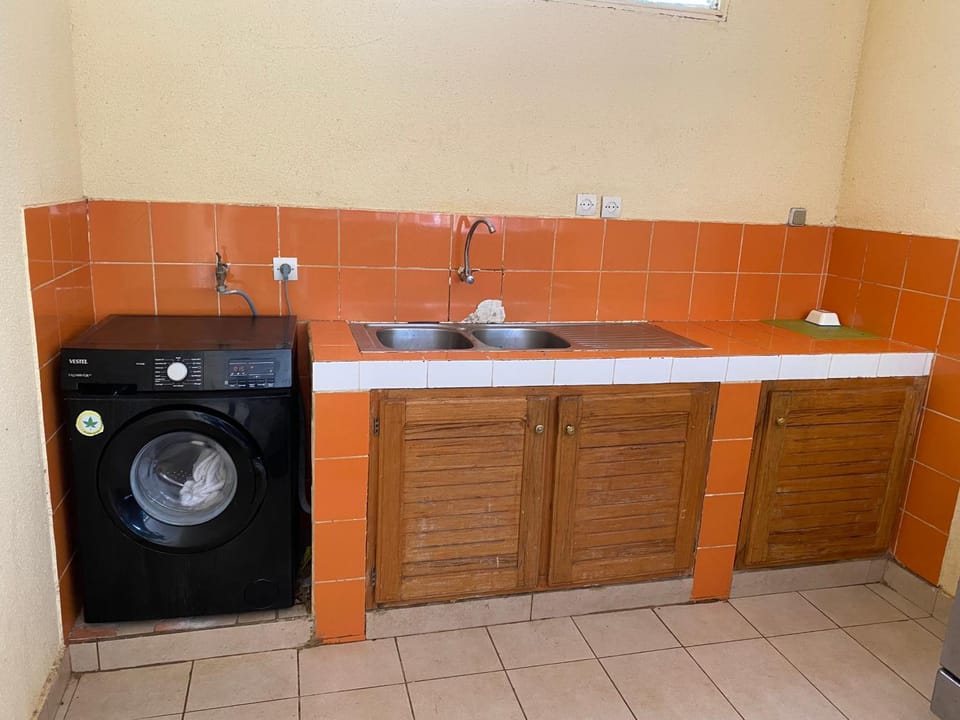 Kitchen or kitchenette, washing machine