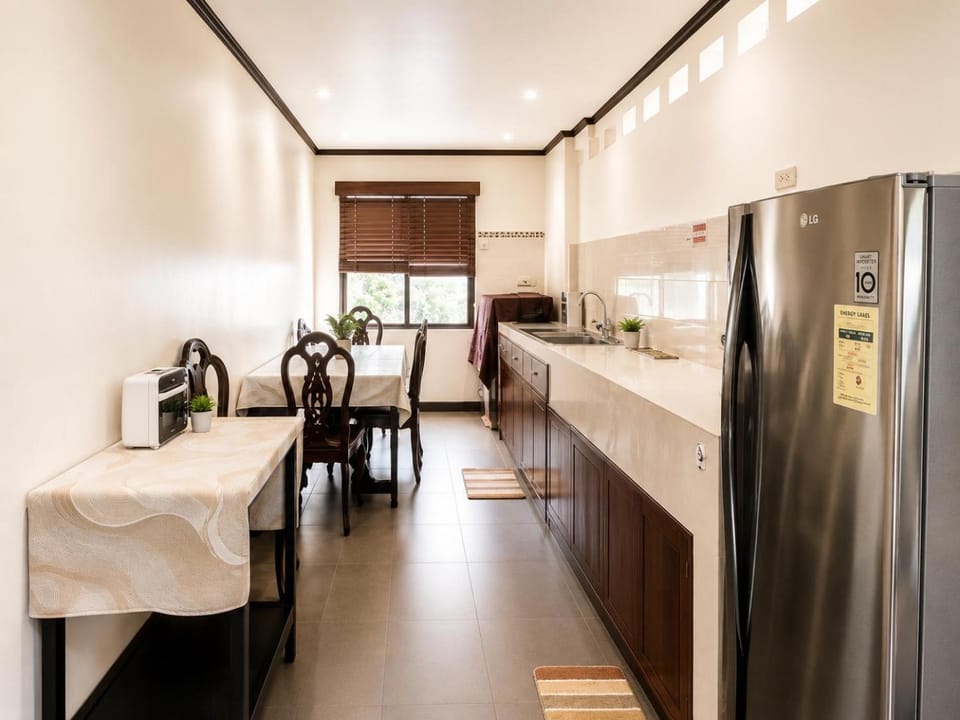 Executive Family Suite King and Single Bed and Sofa Apartment in Puerto Princesa