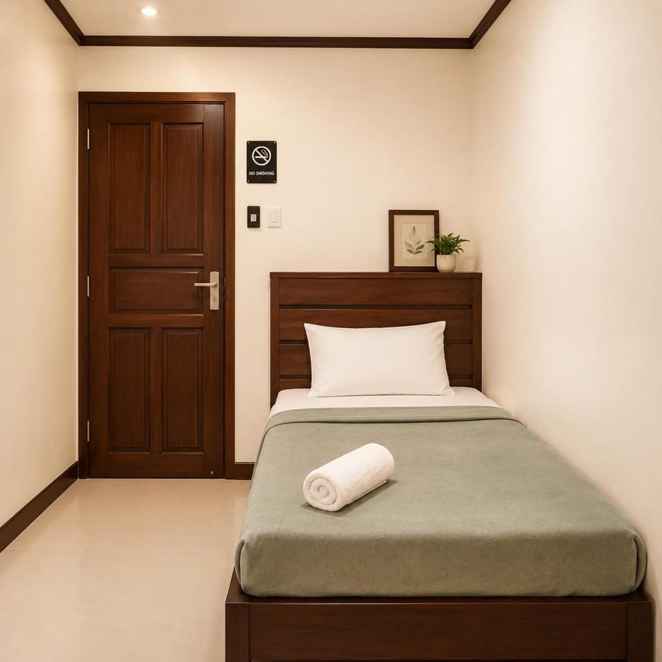 Executive Family Suite King and Single Bed and Sofa Apartment in Puerto Princesa