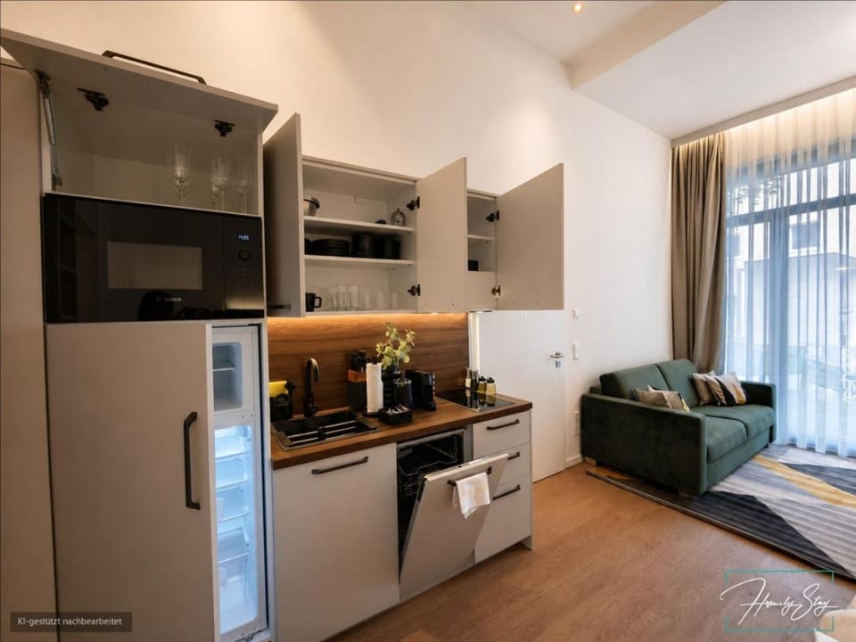 Kitchen or kitchenette, dishwasher, stove, toaster