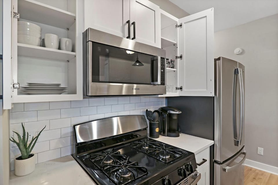 Kitchen or kitchenette, dishwasher, oven, stove, toaster