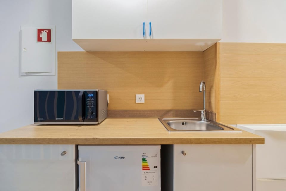 Kitchen or kitchenette, microwave