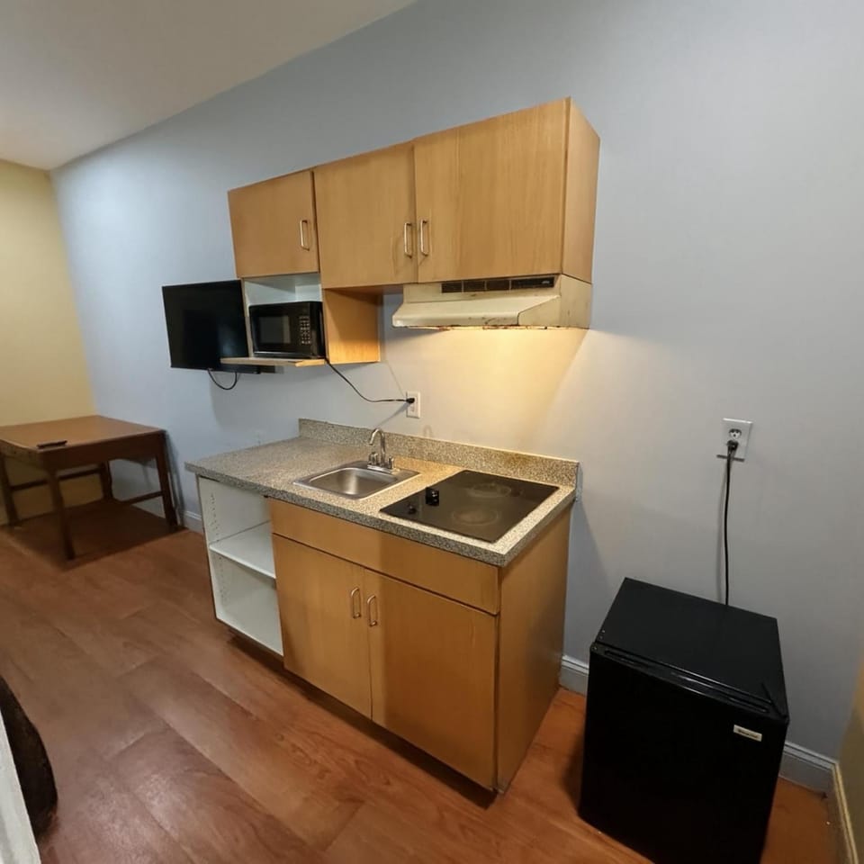 Kitchen or kitchenette, stove