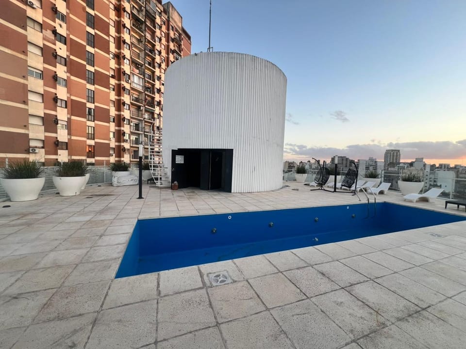 Property building, Off site, Day, Natural landscape, Pool view, Swimming pool, sunbed