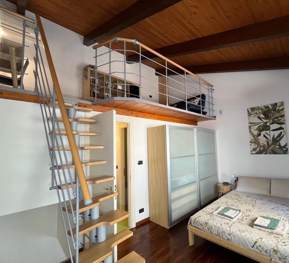 Seating area, Bedroom, towels, wardrobe