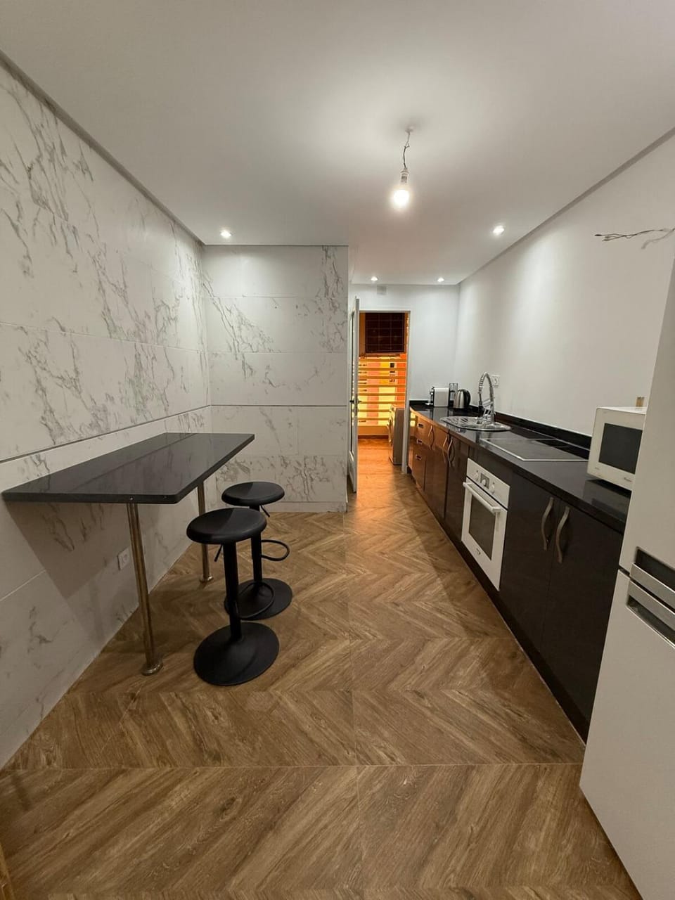 Kitchen or kitchenette, oven, stove